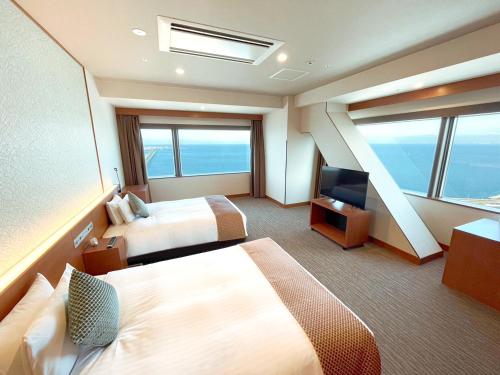 Deluxe Triple Room with Sea View
