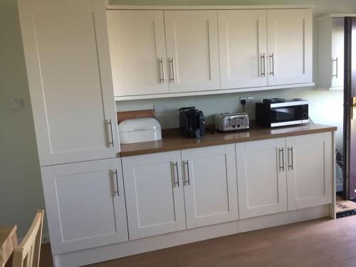 Self Catering house with lovely sea views, 44 Back photo 1