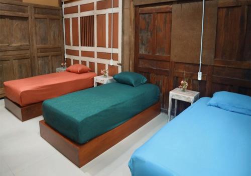 Bed, Omah Bagelen Homestay in Purworejo