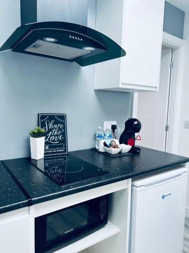 Kitchen, Contemporary studio apartment in Wigan