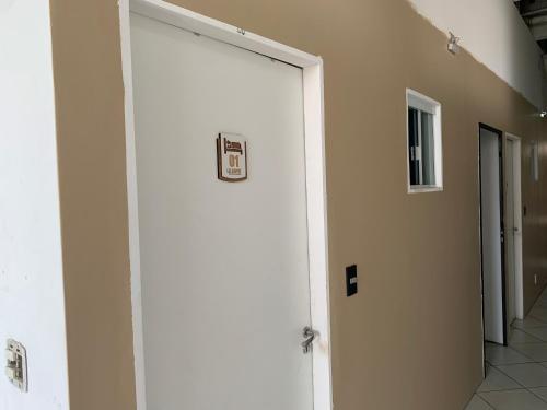 Pousada Internacional EAS 10min Aeroporto in กัวรุลฮอส