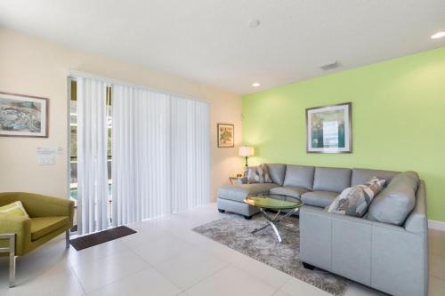 SERENITY 3 Bed 3 Bath Townhome with Pool, Private Balcony, Clubhouse, Communal Pool, Conservation View, Disney 15 mins by Orlando Holiday Rental Homes LLC 1507T in Orlando, USA