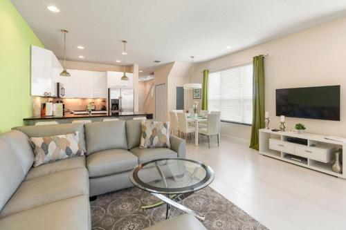 SERENITY 3 Bed 3 Bath Townhome with Pool, Private Balcony, Clubhouse, Communal Pool, Conservation View, Disney 15 mins by Orlando Holiday Rental Homes LLC 1507T in Orlando, USA