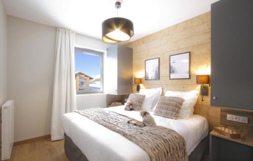 Appart'Hôtel Prestige Odalys L'Eclose in 阿爾卑都埃