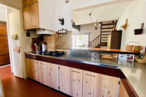 keuken, La Maison des Sauges - Maison de village avec Jardin à 500m de la plage (La Maison des Sauges - Maison de village avec Jardin a 500m de la plage) in Le Grau-du-Roi