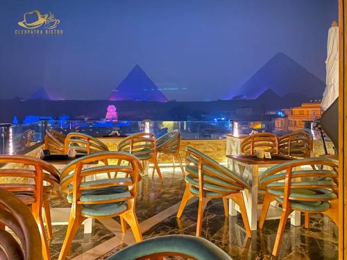 Cleopatra Pyramids View