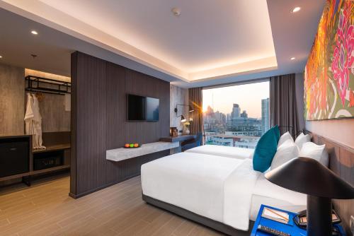 โรงแรมมายเทรียณ์ พระราม 9 กรุงเทพฯ - ชาเทรียม คอลเลกชัน (Maitria Hotel Rama 9 Bangkok - A Chatrium Collection) near โรงพยาบาลกรุงเทพ