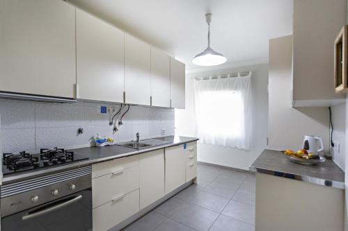Cocina, Apartamento Gulbenkian in Faro