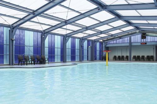 Úszómedence, Luxe familie woning 'De Boskant' in Gramsbergen Kern