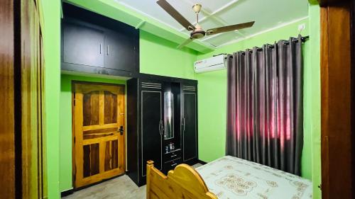 Two-Bedroom Apartment room in Ramya’s Villa