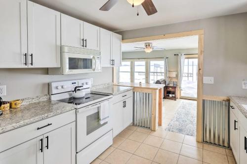 Lakefront Vacation Rental with Fire Pit and Dock! in Arlington