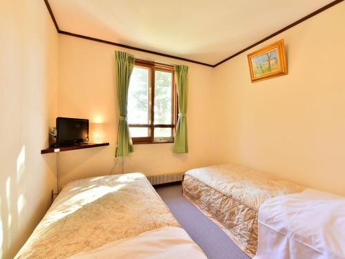 Standard Twin Room with Shared Bathroom