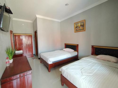 Hotel Asri Baru Room Type - Deluxe Twin Room
