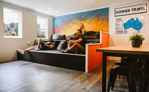 Shared lounge/TV area, Nate's Place Backpackers near AMP Building