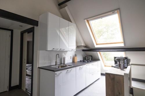 Facilities, 8 person apartment with heated swimmingpool Hoek van Winssen in Winssen