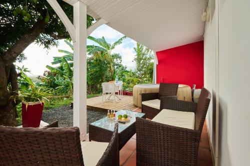 Jardín, Suite cosy avec jacuzzi et jardin - BED AND COFFEE CITY in Ducos