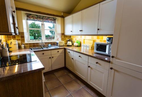 廚房, Hollyhock Cottage, Clematis cottages, Stamford in 小伯份