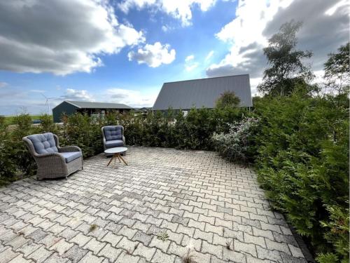 Eigen appartement op boerderij tussen de velden.