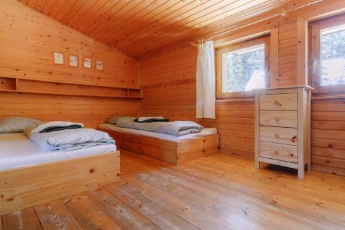 3 twin beds, 1 bunk bed, 1 futon bed