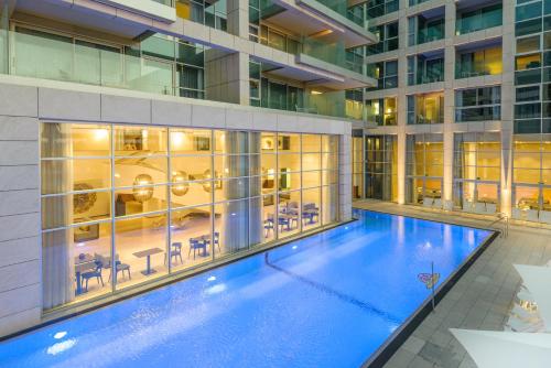 Swimming pool, Herods Herzliya Hotel by the Beach in Herzliya