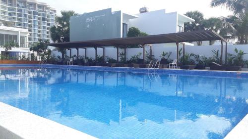 ARIA RESORT-FREE SWIMMING POOL, Relax by sea Hồ bơi miên phí và bãi tắm riêng, 40m ra biển