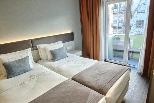 Duplo Charme Boutique Hotel - image 12