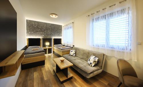 2 twin beds, 1 sofa bed