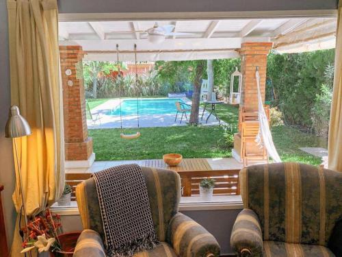 Private Villa with exclusive heated and illuminated pool in the best Golf Country Club 18-holes golf course Indoor heated pool of the club Illuminated professional soccer and tennis courts Children's Recreation Market and all types of services