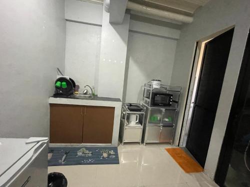 Kitchen, Unit D - Fully furnish 1Bedroom condo in Malolos