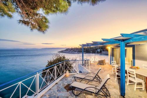 Villa Nikolitsa with private beach - Tap to explore photos