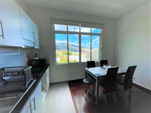 Cocina, One bedroom house with sea view terrace and wifi at Funchal 4 km away from the beach in Funchal