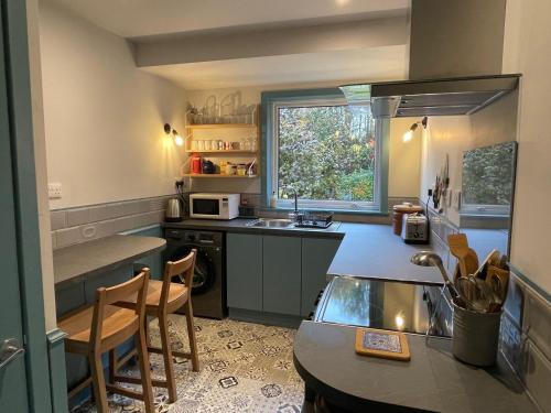 Konyha, One bed cosy Highland cottage near Beauly in Aigas