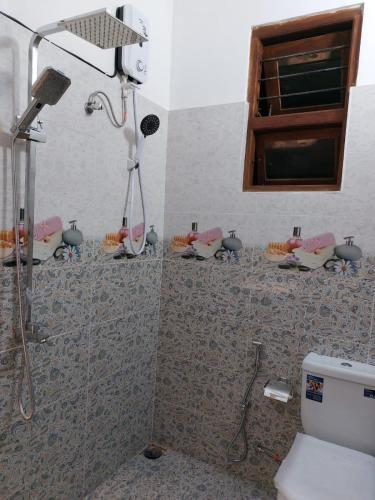 Deluxe Double Room (2 Adults + 1 Child) image 9