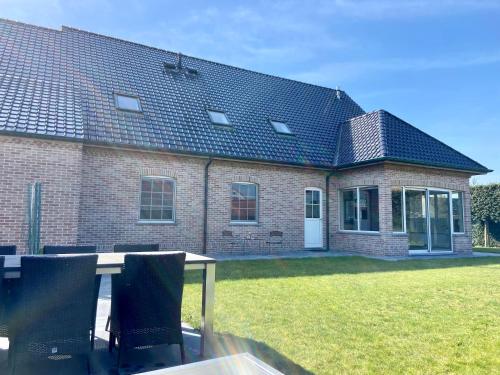 Ruime vakantiewoning tot 14pers. met jacuzzi & zwemvijver - Location saisonnière - Wingene