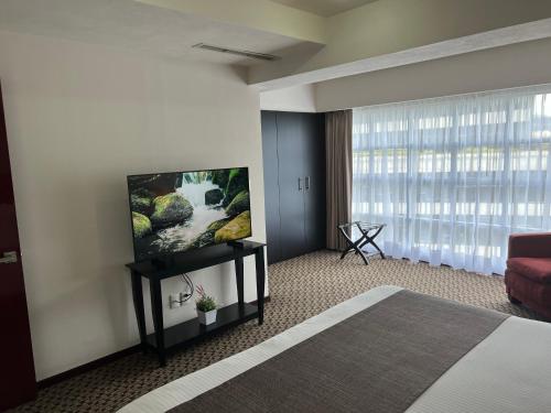 Deluxe One-Bedroom Apartment room in St Isidro Suites Corporate Housing SPA & Wellness Center