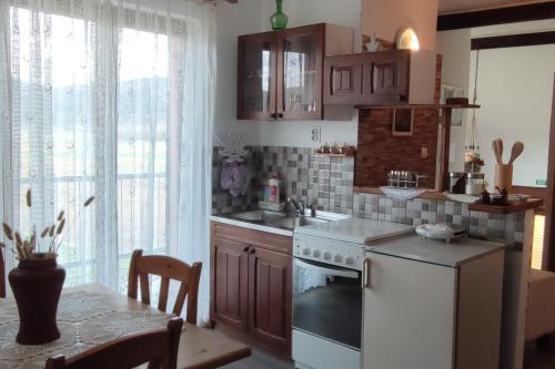 virtuve, Family-friendly apartments with swimming pool Plaski, Velebit - 20466 in Plaski