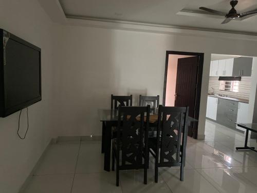 MOONA APARTMENTS AND ROOMS in Malappuram