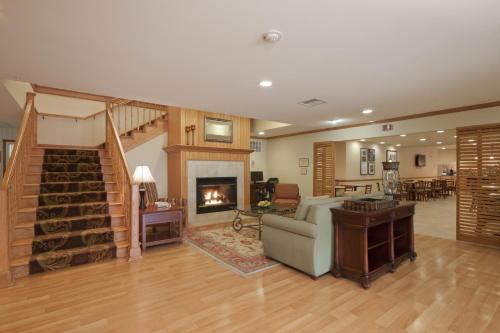 共用Lounge/電視區, Country Inn & Suites by Radisson, Davenport - Quad Cities in 達文波特