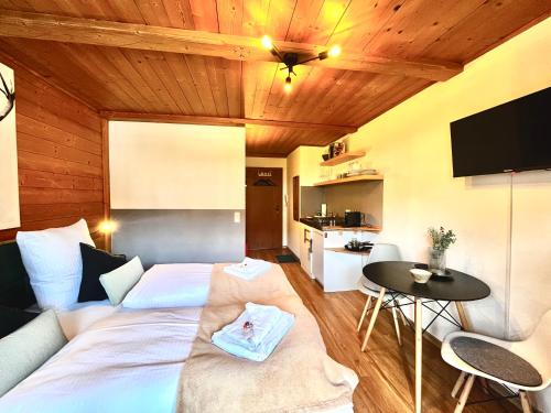 Ferienwohnung "Alpenglühen" - Direkt am Schliersee mit Frühstück & Sauna