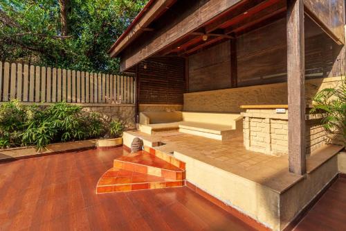 StayVista's The Happy Hive - Cozy rooms and a pool for a delightful stay photo 3