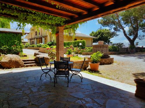 Jardín, Agriturismo Le Vigne in San Casciano Dei Bagni