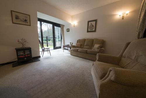 A szálláshely kívülről, Grange Cottage Lakeside Windermere in Rusland