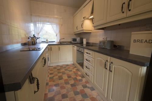 A szálláshely kívülről, Grange Cottage Lakeside Windermere in Rusland
