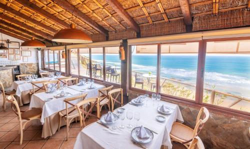 Étterem, 25 négyzetméteres, 1 hálószobás Apartman 1 fürdőszobával Fuente del Gallo Beach területén (Apartamentos El Roqueo) in Fuente del Gallo Beach