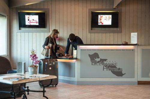 Elégance Suites Hôtel - image 10