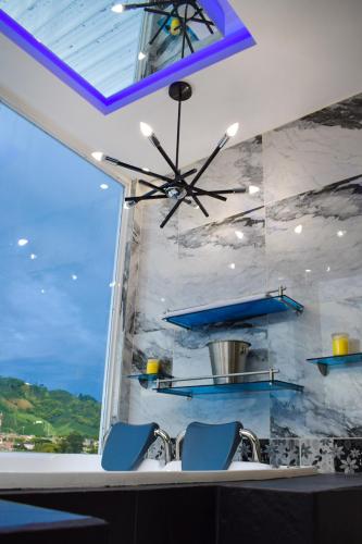 ทางเข้า, Ayenda Ceiba Rooms near สนามบินนานาชาติมาเตกาญา