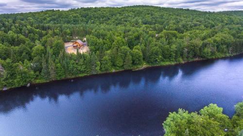 Chalet bois rond aux paysages uniques avec Spa !