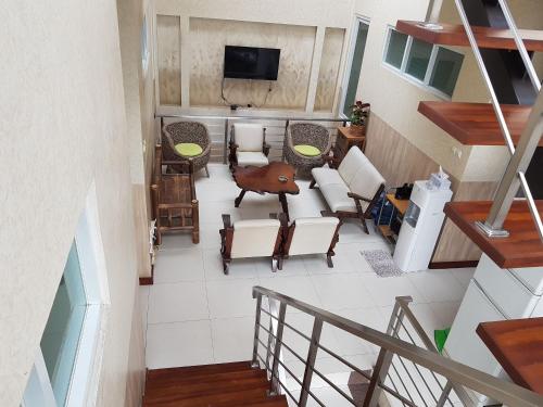 Shared lounge/TV area, G10 Guest House Near Asia Afrika Bandung in Bandung