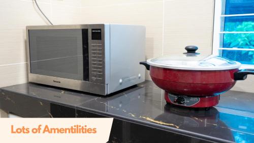 Spacious 5 Bedroom Holiday Home Perfect for Gatherings BBQs Rumah Holiday Big 5BR House for 20 Guests - Ideal for Family Celebrations 宽敞整栋别墅 5 间大房间 20人 家庭聚会 生日派对 烧烤聚会 photo 2