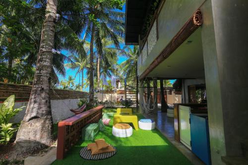Shared lounge/TV area, Beach People Hostel in Bantayan Island